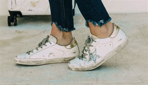 golden goose sneakers look dirty.